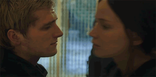 Yahoo Entertainment — Katniss and Peeta hug it out in The Hunger Games:...