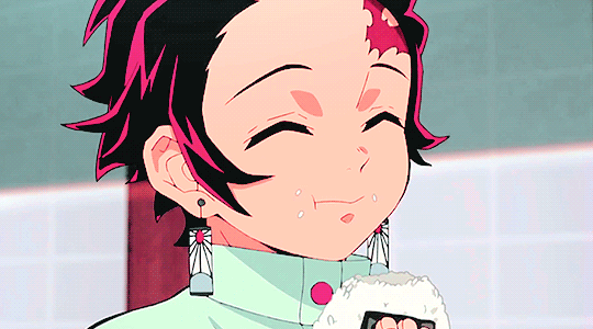 tanjiro eating rice ball