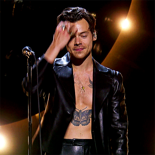 Harry Styles Opened The Grammys Shirtless In A Leather Suit And We